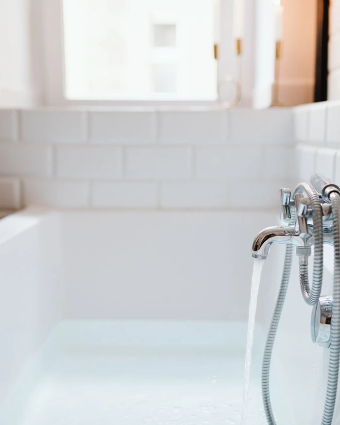 A resurfaced bathroom vanity counter with a white basin
